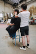 © Luciano Spinelli/Stocksy - Haircut in a industrial loft