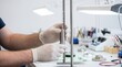 © Stitch - Technician working with precision measuring instruments in a clean laboratory environment