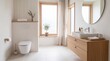 © Sekai - Clean Minimalist Bathroom Featuring White Toilet And Light Oak Wood Elements Soft Diffused Ambient Lighting