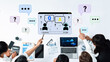 © InfiniteFlow - Group of professionals engaging in a question and answer session with digital interface and data analysis elements in an office setting. Glyphic.