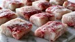 © Sanju - Raw fish fillets portioned and arranged on a marble surface