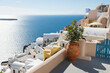 © Cavan Images - Cycladic architecture in Santorini island, Greece. Sea view at sunset
