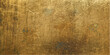 © Julya - A close-up, textured view of a scratched and weathered golden metallic surface, revealing subtle imperfections and a rich, antique patina.