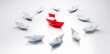 © peterschreiber.media - Group of  white paper boats with red leader in the middle on white background - 3D illustration
