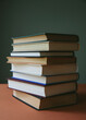 © Rialto Images/Stocksy - Stack of hardcover books