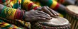 © Ilmi - Traditional Ghanaian Soccer Fan Playing Percussion Instruments at a Cultural Celebration Event