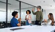 © sunlight789 - Diverse Team Applauding Success in Modern Office Meeting