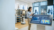 © AW Studio - Retail store manager using a tablet to monitor ai inventory optimization and customer foot traffic analytics