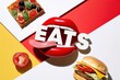 © ART BY SAIFUL - Conceptual food art with red lips and burger isolated on white background