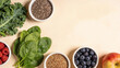 © Boontharika - Flat Lay of Healthy Superfoods for Hormone Balance Nutrition