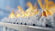 © Thanakit  - Close up of flames over bed of salt, showcasing intense heat and vibrant colors of fire, creating dramatic visual effect