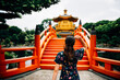 © Westend61 - China, Hong Kong, Diamond Hill, Nan Lian Garden, Female tourist lookint at Golden Pavilion of Absolute Perfection