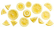 © Elvin - Fresh yellow lemon slices and wedges scattered