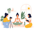 © danial - Group of women practicing yoga and filming content for social media.