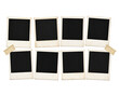 © Rosi - Eight blank polaroid photos arranged in two rows on a surface