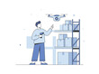 © sitifatimah - Man with drone and scanner in warehouse checking inventory boxes from shelf