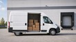 © Рудой Максим - Delivery van parked at warehouse with boxes loaded in the back during daytime