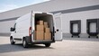 © Рудой Максим - Delivery van parked at loading area with stacked boxes ready for unloading in broad daylight