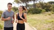© Eve - Laughing young athletic couple jogging on sunny nature trail together. Healthy active lifestyle, summer morning workout, fitness lovers running, commercial cardio sports concept.