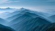 © TETSUBIN - AI生成した、霞がかった淡い青の山並みが地平線まで幾重にも折り重なる幻想的な日本の山岳パノラマ｜静謐な朝靄の中に浮かぶ水墨画のような絶景