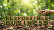 © Emre Akkoyun - Responsible business concept with mossy wooden blocks and a mannequin hand holding a green seedling in nature, symbolizing growth and sustainability