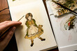 © Edson family/Stocksy - Beautiful painting of a girl with her teddy bear