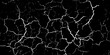 © Imam - Abstract dark background featuring a dramatic high contrast texture of white cracked fissures and dry lines on a solid black surface.