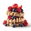 © Kelumlakmal - Sugar-free dessert banana oat mini pancakes stacked isolated on a white background