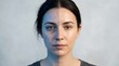 © Adil - Split face portrait of a woman showing skin comparison between tired textured skin and smooth glowing complexion for skincare concept