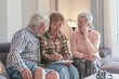 © luciano - Adult daughter helping her senior parents with financial documents and home organization, providing support and advice while reviewing important agreements and legal forms