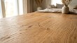 © Rima - Wooden table with vase and pillows.