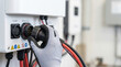 © MP-AI - Solar panels installation technician connects cables to homes inverter system for efficient renewable energy power supply