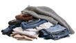 © Luca - Pile of folded casual clothing jeans sweaters shirt, trousers