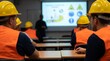 © StocksJust4You - Construction workers seated in training classroom, watching presenter present safety training, wearing protective helmets, workplace compliance education, professional learning environment