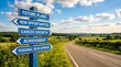 © Lambe - Directional signs on rural road: future plans, new opportunities, career and achievement