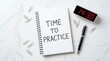 © Pinit - Educational productivity reminder showing Time To Practice written on a spiral notebook.