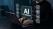 © Top seller  - Man typing on laptop with virtual AI coworker digital assistant interface screen