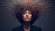 © Nataliia_Trushchenko - A conceptual surreal portrait of a middle-aged caucasian woman in a black blazer, looking upward with a contemplative expression. Above her head, a chaotic tangle of vibrant multicolored lines
