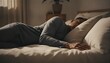 © QuoDesign - Middle aged man resting peacefully in a sun drenched bedroom with soft linen bedding, reflecting a calm and quiet morning atmosphere