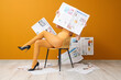 © Pixel-Shot - Young woman in high heels with many newspapers sitting on chair near orange wall