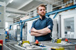 © Westend61 - Portrait of a confident young man in a factory