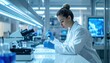© LuqmanAzman - Focused scientist in laboratory conducting precise liquid transfer with pipette into test tubes