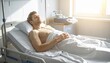 © HakimRashid - Patient recovering in a comfortable hospital bed with sunlight streaming in