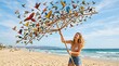 © PegawaiNegriStock - Woman holding umbrella with flock of colorful birds flying around on beach