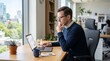 © imagemir - Focused young Caucasian man in a cozy office, analyzing data on his laptop with a thoughtful expression.