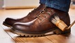 © Miguel - cleaning muddy boot soles before entering home