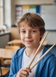 © KIMOG - Smiling pupil standing in school corridor with backpack ready for learning