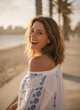 © KIMOG - Cheerful Woman Enjoying Summer Vacation Walking on Tropical Beach