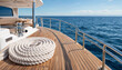 © Hashir - Luxury Yacht Wooden Teak Deck with Coiled Marine Rope Sailing on Blue Sea