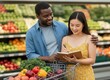 © KIMOG - Happy African American Man Looking at Asian Woman Holding Notebook While Grocery Shopping